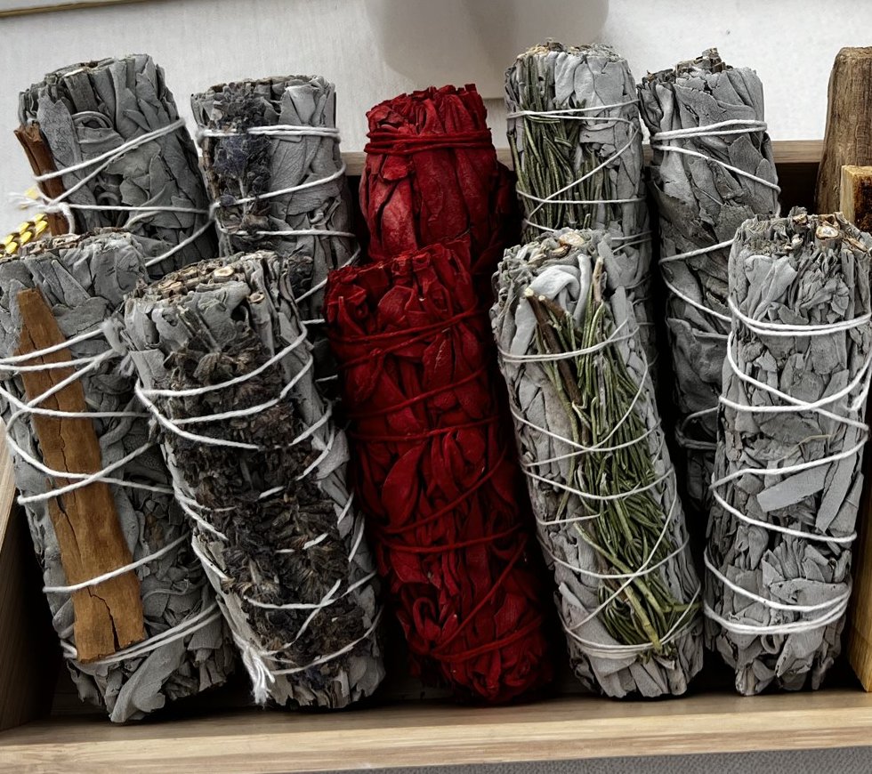 Hand-tied white sage, lavender sage, rose sage, rosemary, and palo santo bundles